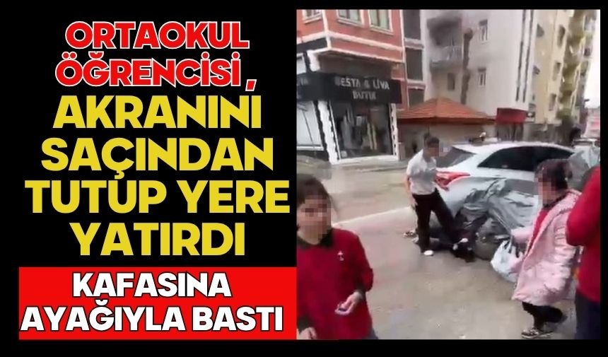 Ortaokul öğrencisi akranını saçından tutup yere yatırdı, kafasına ayağıyla bastı