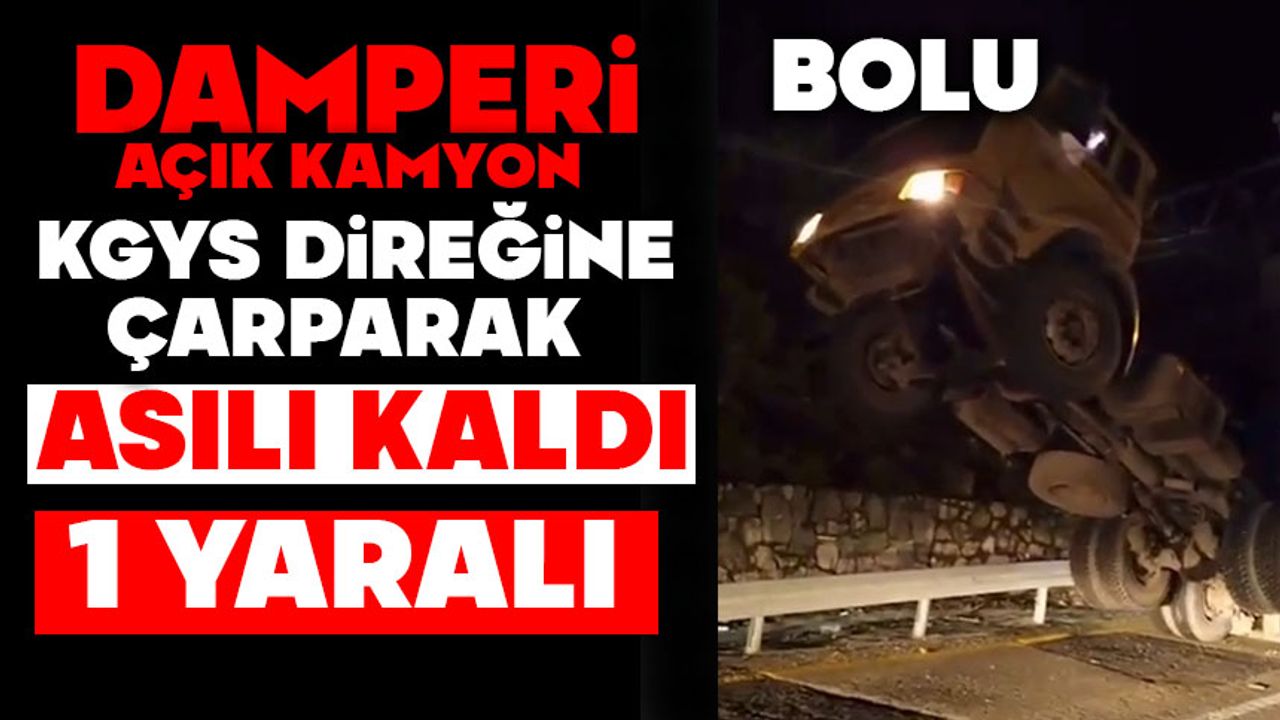 Damperi açık kamyon KGYS direğine çarparak asılı kaldı: 1 yaralı