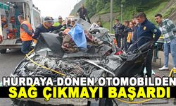 HURDAYA DÖNEN OTOMOBİLDEN SAĞ ÇIKMAYI BAŞARDI