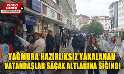 YAĞMURA HAZIRLIKSIZ YAKALANAN VATANDAŞLAR SAÇAK ALTLARINA SIĞINDI