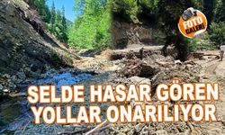 Selde hasar gören yollar onarılıyor