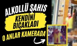 Alkollü şahıs kendini bıçakladı: O anlar kamerada