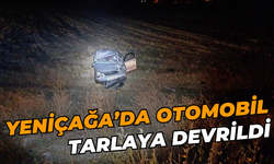 YENİÇAĞA’DA OTOMOBİL TARLAYA DEVRİLDİ