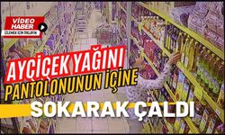 Ayçiçek yağını pantolonunun içine sokarak çaldı