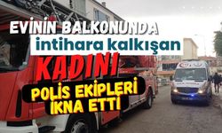 Evinin balkonunda intihara kalkışan kadını polis ekipleri ikna etti