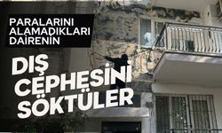 Paralarını alamadıkları dairenin dış cephesini söktüler