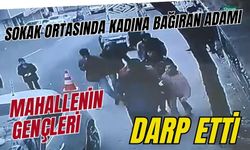 Sokak ortasında kadına bağıran adamı mahallenin gençleri darp etti