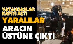 Vatandaşlar kapıyı açtı, yaralılar aracın üstüne çıktı