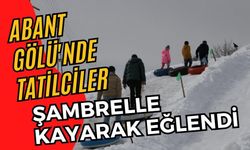 Abant Gölü'nde tatilciler şambrelle kayarak eğlendi