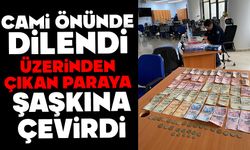 Cami önünde dilendi, üzerinden çıkan parayla şaşkına çevirdi