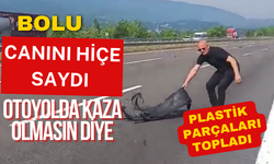 Canını hiçe saydı, otoyolda kaza olmasın diye plastik parçaları topladı