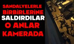 Sandalyelerle birbirlerine öldüresiye saldırdılar