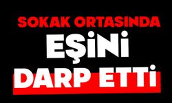 Sokak ortasında eşini darbetti...