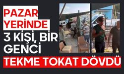 Pazar yerinde 3 kişi, bir genci tekme tokat dövdü