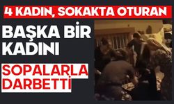 4 kadın, sokakta oturan başka bir kadını sopalarla darbetti