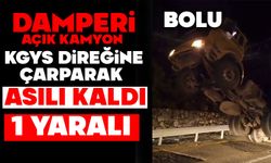 Damperi açık kamyon KGYS direğine çarparak asılı kaldı: 1 yaralı