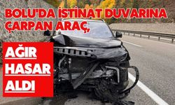 Bolu'da istinat duvarına çarpan araç, ağır hasar aldı