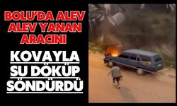 Bolu'da alev alev yanan aracını kovayla su döküp söndürdü