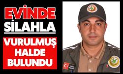 Evinde silahla vurulmuş halde bulundu