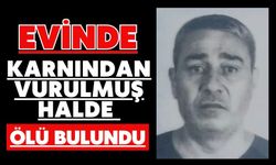 Evinde karnından vurulmuş halde ölü bulundu