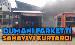 Kapalı dükkandan gelen dumanı gördü faciayı önledi