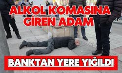 Alkol komasına giren adam banktan yere yığıldı