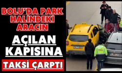 Park halindeki aracın açılan kapısına taksi çarptı