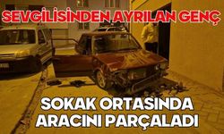 Sevgilisinden ayrılan genç sokak ortasında aracını parçaladı