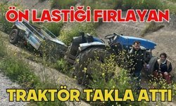 Ön lastiği fırlayan traktör takla attı