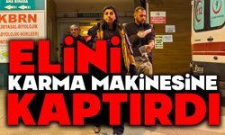 Elini karma makinesine kaptırdı