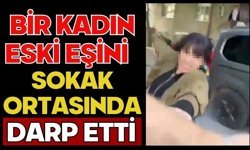 Bir kadın eski eşini sokak ortasında darp etti