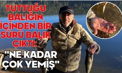 Tuttuğu balığın içinden bir sürü balık çıktı: "Ne kadar çok yemiş"