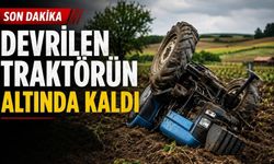 Devrilen traktörün altında kaldı