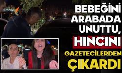 Bebeğini arabada unuttu, hıncını gazetecilerden çıkardı