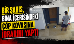 Bir şahıs, bina içerisindeki çöp kovasına idrarını yaptı