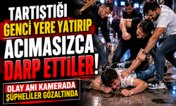Tartıştığı genci yere yatırıp acımasızca darp ettiler