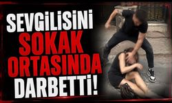 Sevgilisini sokak ortasında darbetti!