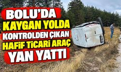 Bolu'da kaygan yolda kontrolden çıkan hafif ticari araç yan yattı