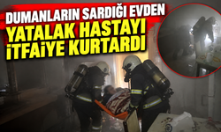 Dumanların sardığı evden yatalak hastayı itfaiye kurtardı