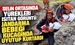 Selin ortasında yürekleri ısıtan görüntü: Jandarma bebeği kucağında uyutup kurtardı