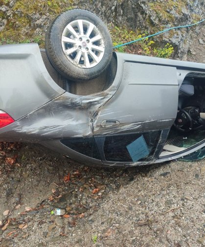 Takla atan otomobilden yara almadan kurtuldu