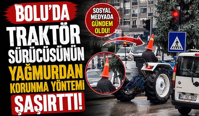 Bolu'da traktör sürücüsünün yağmurdan korunma yöntemi şaşırttı