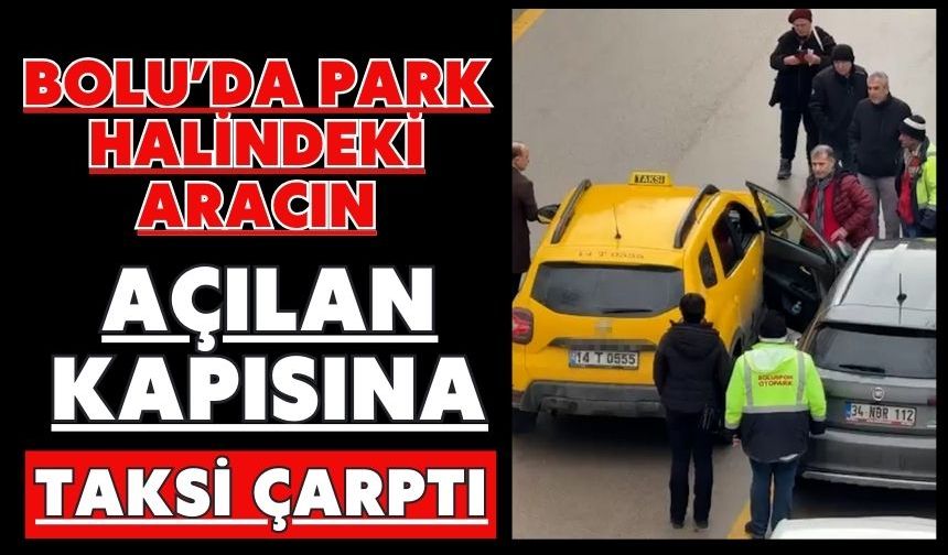 Park halindeki aracın açılan kapısına taksi çarptı