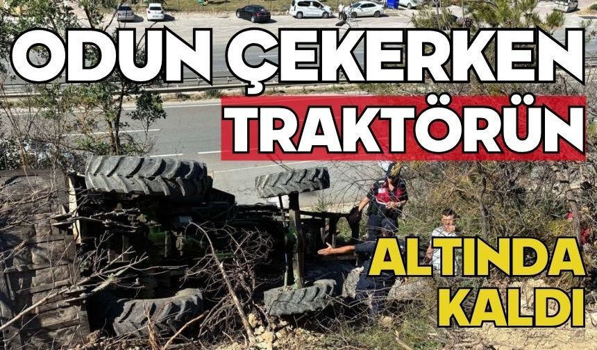 Odun çekerken traktörün altında kaldı